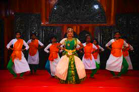 Nicobarese tribal dancer in traditional costume performing island dance