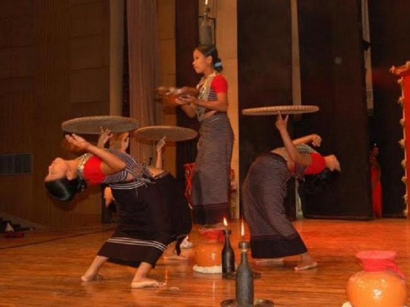 Hojagiri Dancer performing traditional balancing dance from Tripura