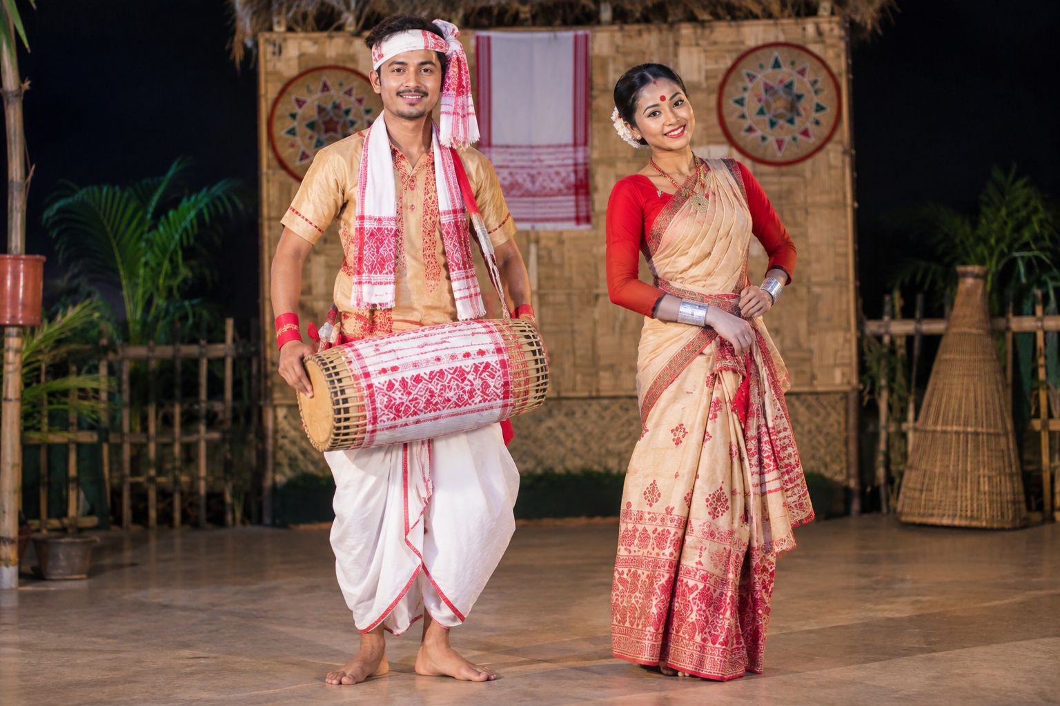 Bihu dancer dressed in traditional Assamese attire with jewellery and flowers in her hair