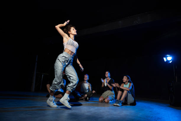 Professional Krump dancer performing aggressive street dance at urban event