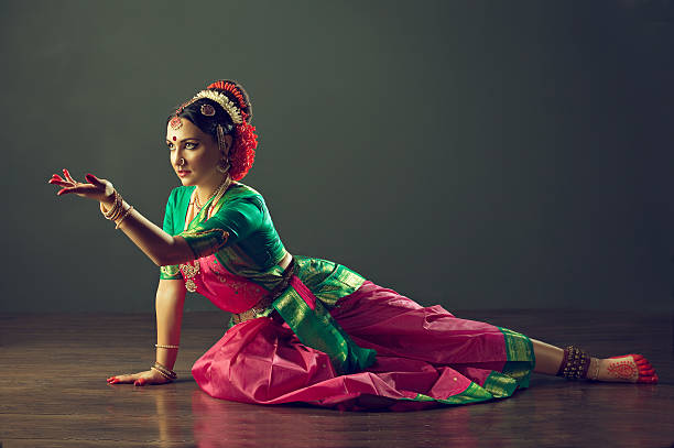 Kuchipudi dancer performing in traditional costume