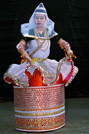 Professional Manipuri Raas Leela dance performance with traditional costumes