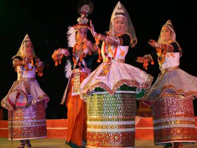 Classical Manipuri dance performance with graceful movements