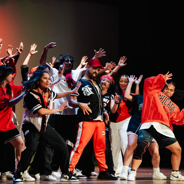 Professional Popping dancer performing robotic street dance at urban event