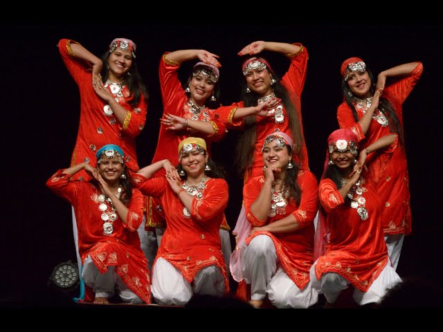 Synchronized Rouf dance formation at festival with group performance