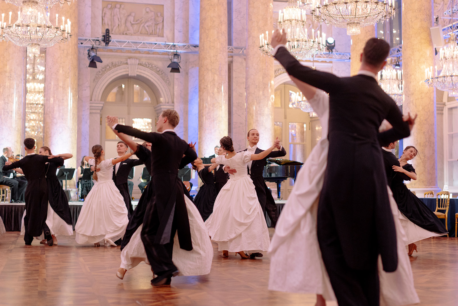 Professional Waltz dancers performing elegant ballroom dance at luxury event